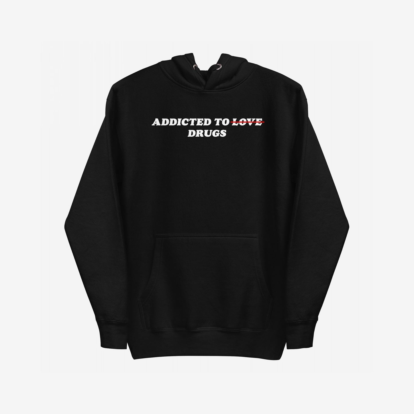 Addicted To Love / Drugs Hoodie EU features ADDICTED TO LOVE with LOVE crossed out, replaced by DRUGS below. A midweight pullover with a kangaroo pocket, embodying dark humor and emotional resilience.