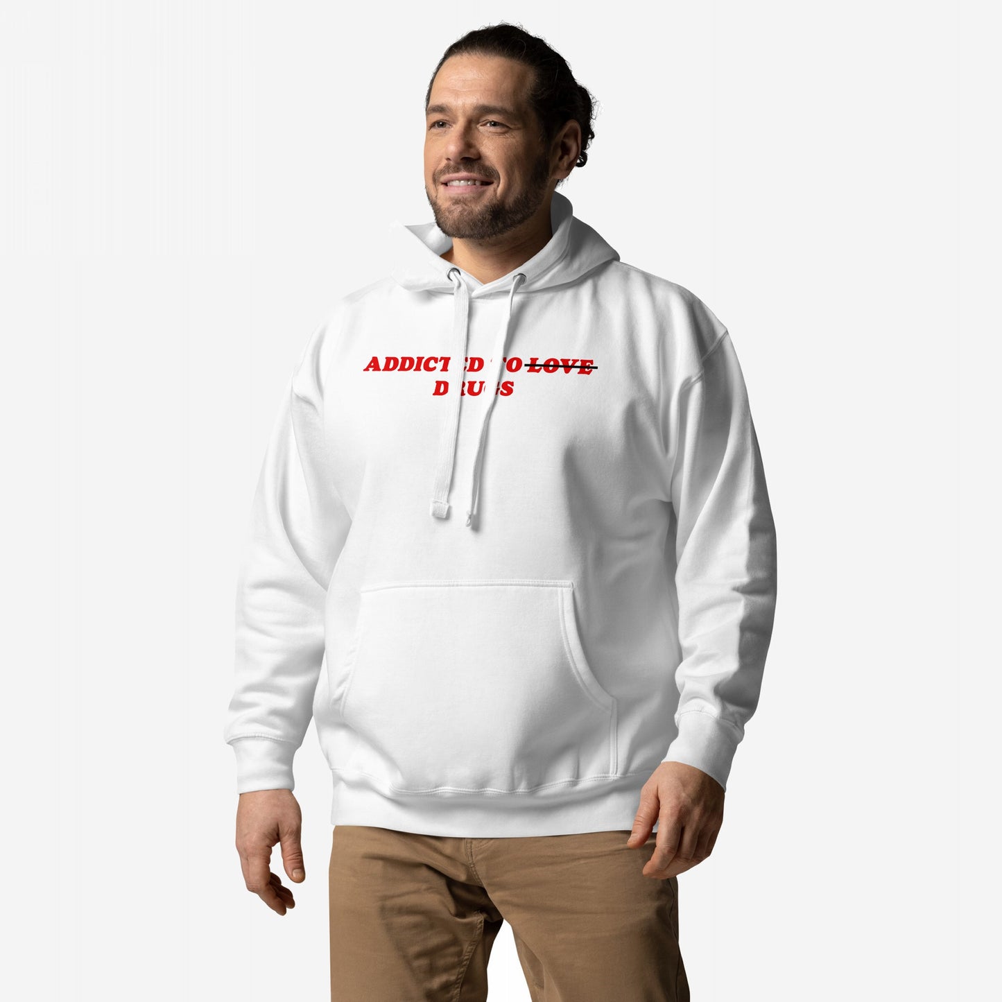 Model wearing the Addicted To Love / Drugs Hoodie EU, featuring crossed-out text design, embodying dark humor and rebellion. Ideal for those seeking comfort in challenging times, supporting mental health awareness through style.