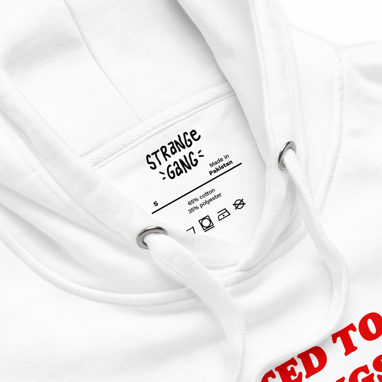 Close-up of the Addicted To Love / Drugs Hoodie EU showing its white hood with drawcords, heat-pressed label, and a hint of red text. This midweight hoodie symbolizes soft rebellion and emotional resilience.