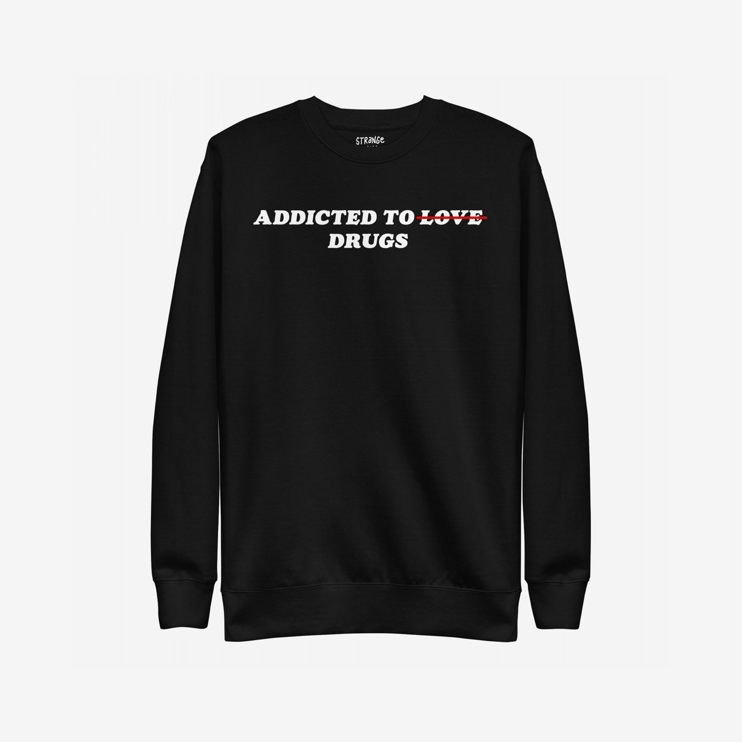 Black crewneck sweatshirt featuring bold white text ADDICTED TO LOVE with LOVE crossed out in red, replaced by DRUGS. The Addicted To Love / Drugs Sweatshirt EU symbolizes dark humor and candid self-expression.