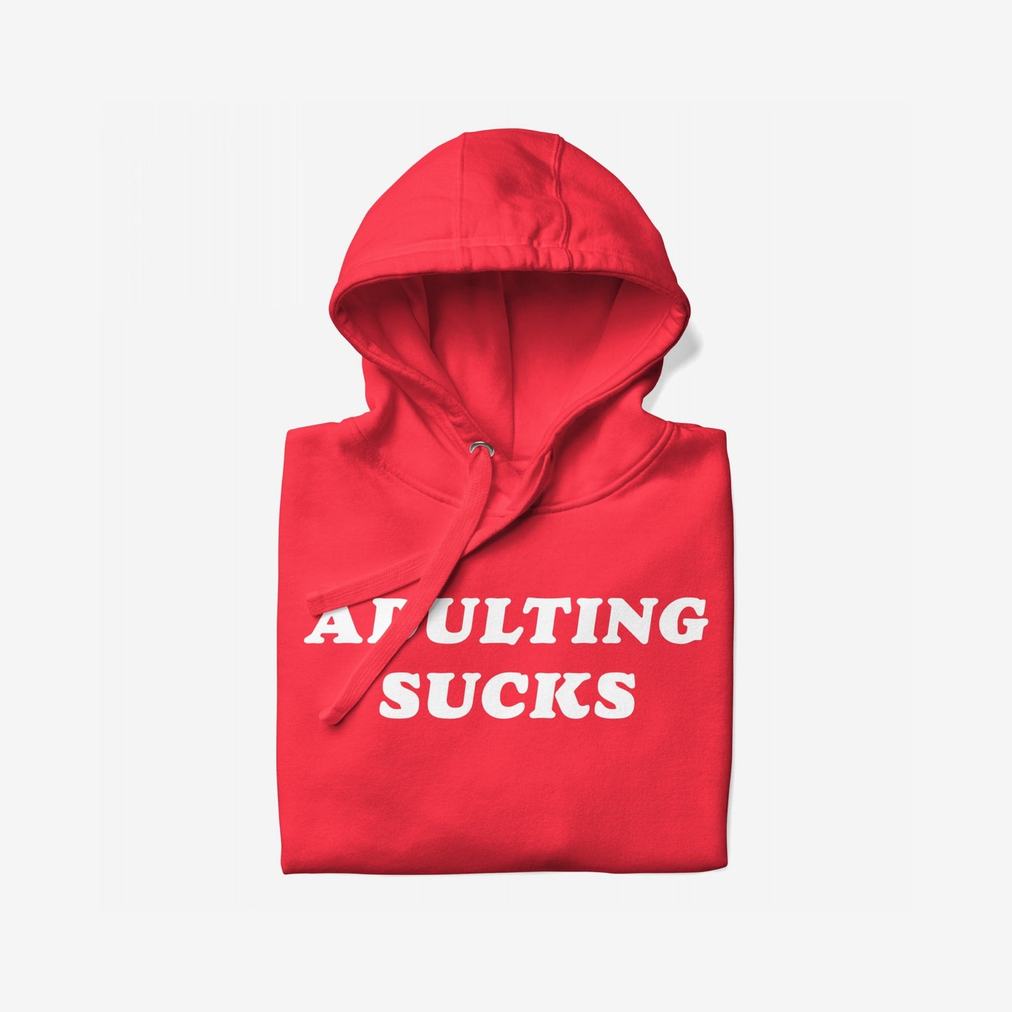 Folded red Adulting Sucks Hoodie EU with hood up, showcasing bold white text. Unisex and midweight, it humorously critiques adult life, supporting NAMI, reflecting Egoproof's mental health awareness ethos.