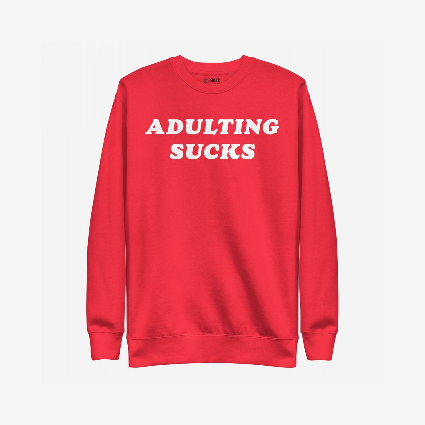 Adulting Sucks Sweatshirt EU: A red crewneck sweatshirt featuring bold white “ADULTING SUCKS” text, perfect for expressing the struggles of everyday life with humor and style.