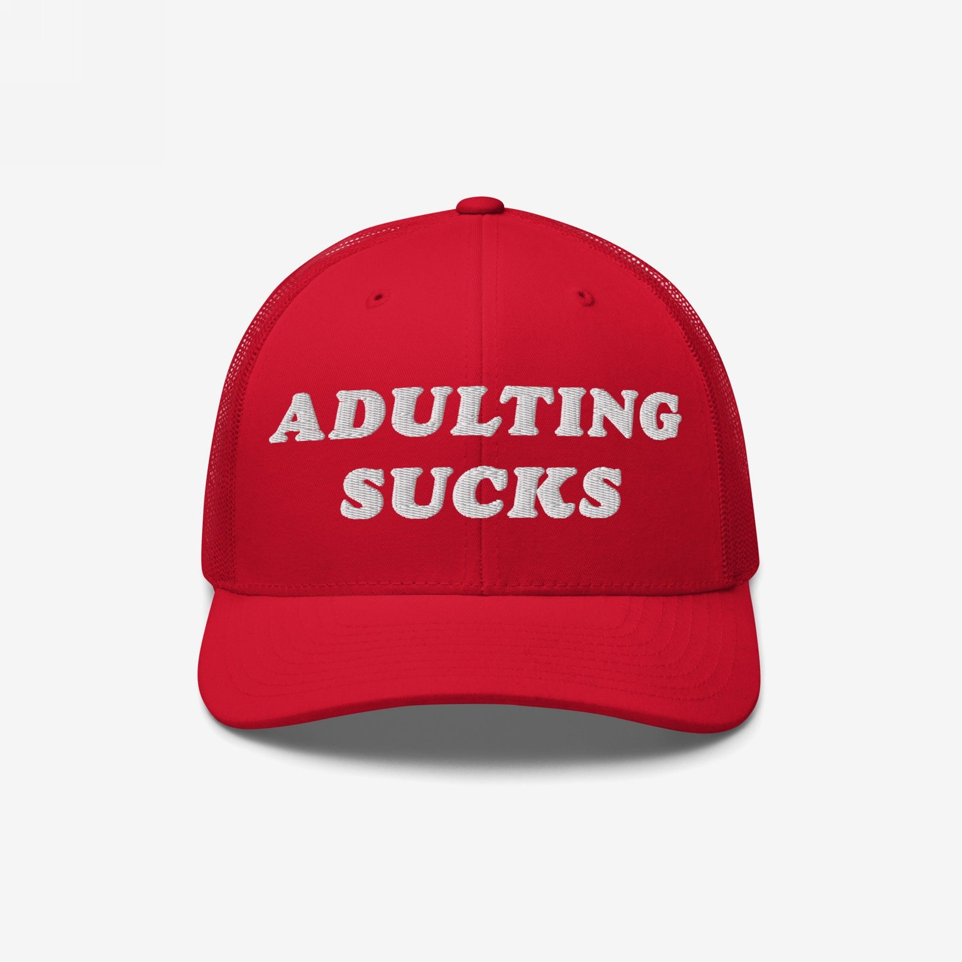 Adulting Sucks Hat: A red trucker cap with bold white embroidery stating ADULTING SUCKS, reflecting a vintage, honest style perfect for expressing mental health struggles and life's burdens.