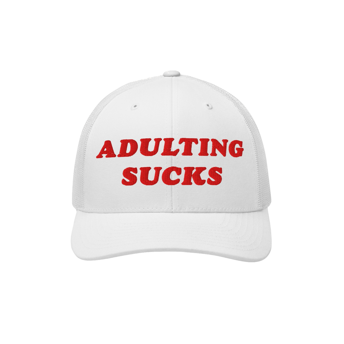 White mesh-back trucker cap with ADULTING SUCKS embroidered in bold red on front. Designed for those overwhelmed by life's de