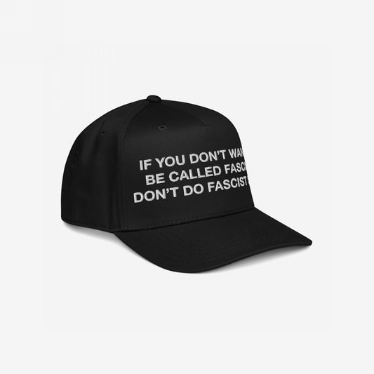 Anti-Fascist Hat: A structured, black baseball cap with a bold white embroidered slogan demanding accountability. Features an adjustable snapback and subtle EGOPROOF embroidery on the back, embodying courage and resistance.