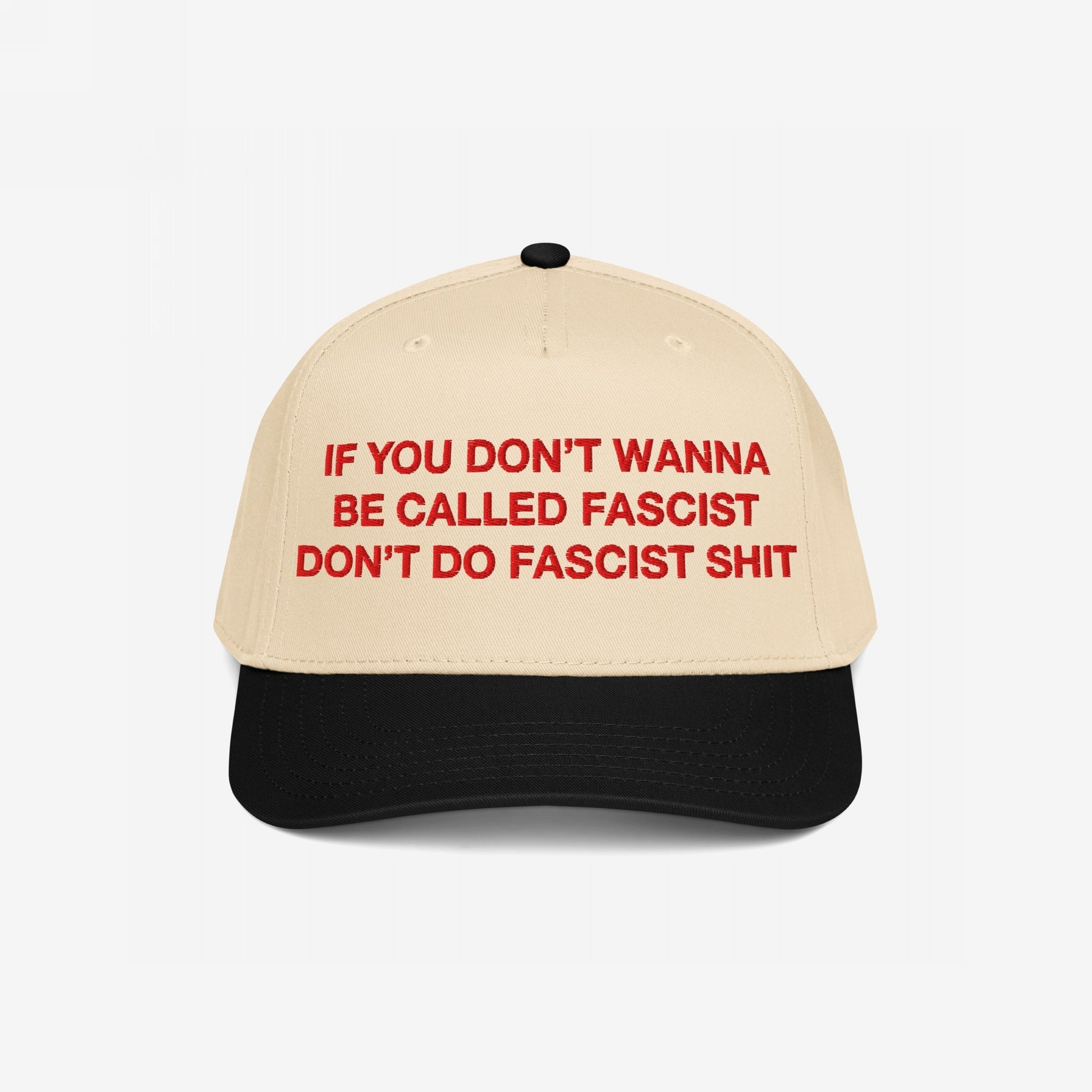 Anti-Fascist Hat with beige crown and black brim, featuring bold red embroidery: If you don’t wanna be called fascist, don’t do fascist shit, embodies Egoproof's stand against hate and injustice.