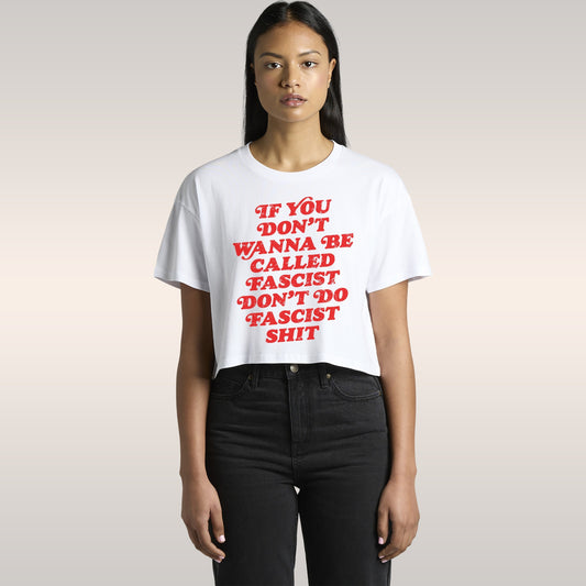 Anti-Fascist Women's Baby Tee featuring bold white text on a black, short-sleeved crop top. The shirt empowers wearers with i