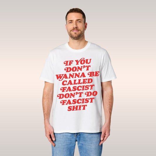 Two young adults in a skate-park wear Anti-Fascist T-shirts with a bold slogan, embodying Egoproof’s commitment to powerful