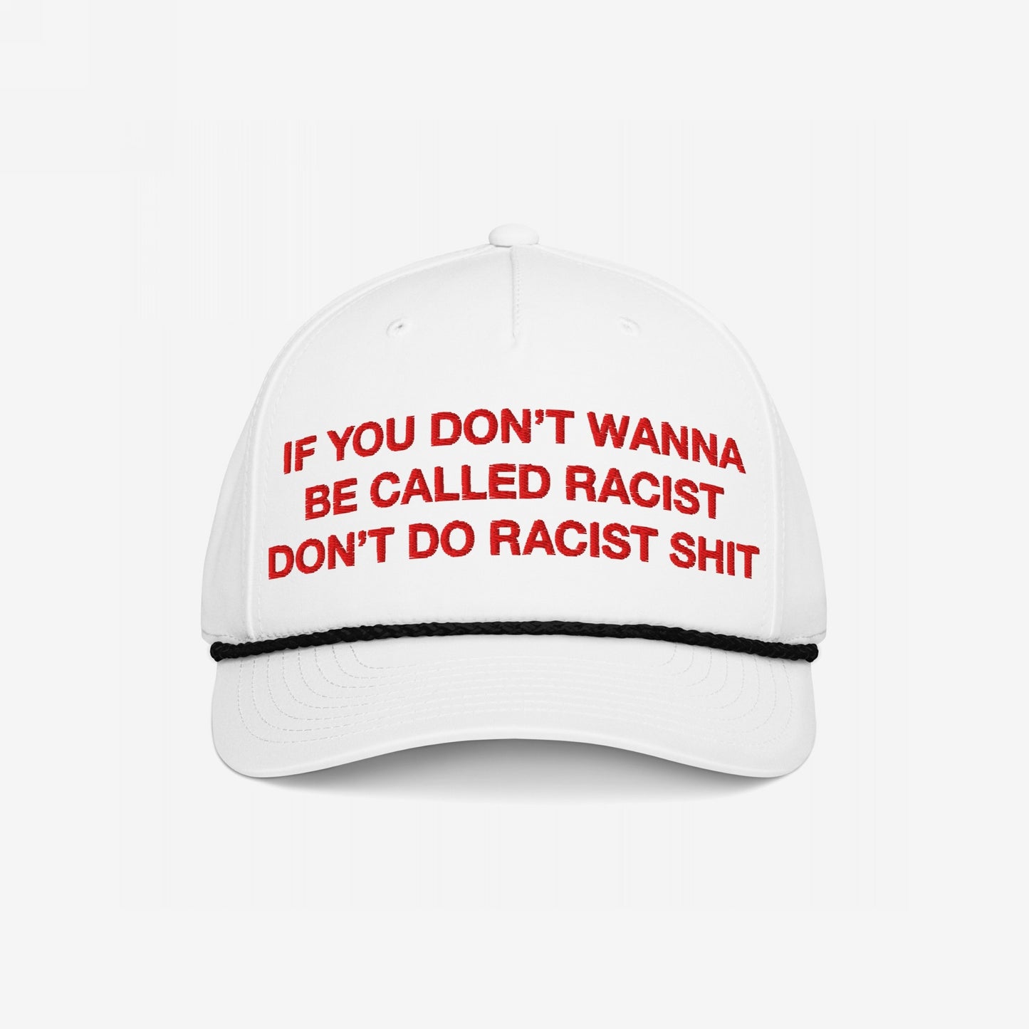Anti-Racist Hat features bold red embroidery: “IF YOU DON’T WANNA BE CALLED RACIST DON’T DO RACIST SHIT,” on a white cap with black braided cord, reflecting Egoproof's powerful statement ethos.