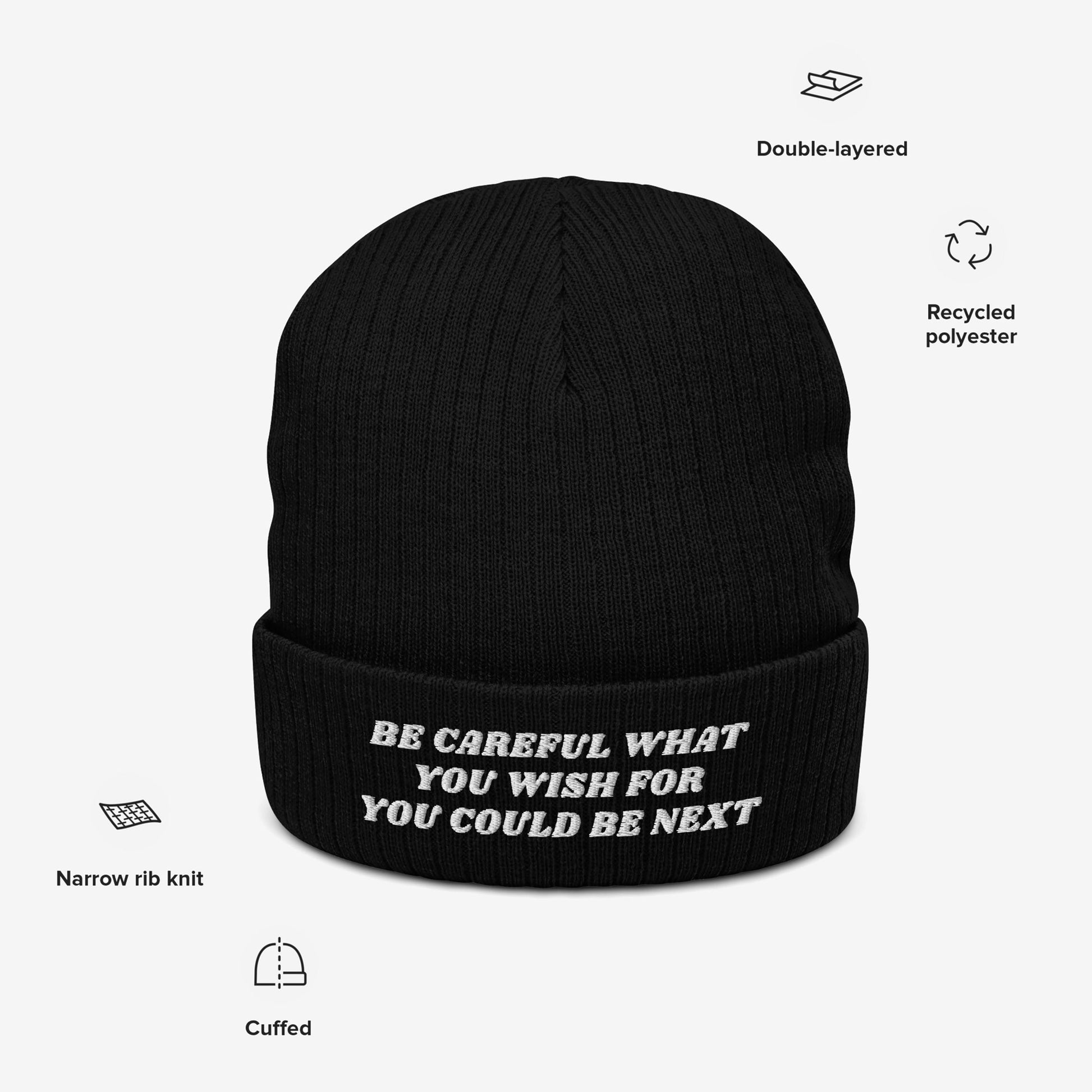 Black knit beanie with Be Careful What You Wish For You Could Be Next embroidered in white, featuring double-layered recycled polyester and narrow rib knit, embodying bold, unapologetic statements against extremism.