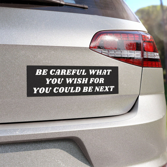 Be Careful Sticker & Magnet displayed on a silver car's rear, partially showing the taillight and hatch, with a bold message advocating awareness. Ideal for cars or fridges, embodying Egoproof's empowering statements.