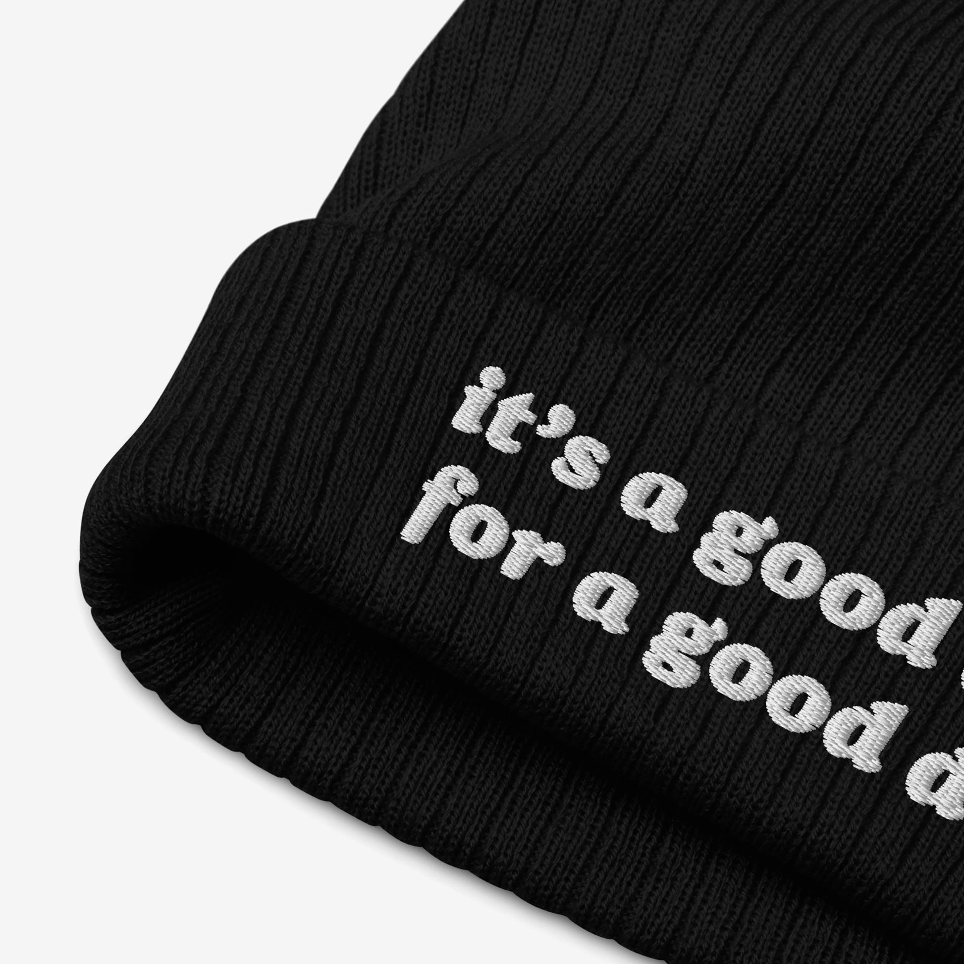 Black ribbed knit beanie hat with “it’s a good day for a good day” embroidered on the cuff, embodying the Good Day Hat's positive message. Perfect for mental health advocates and positivity supporters.