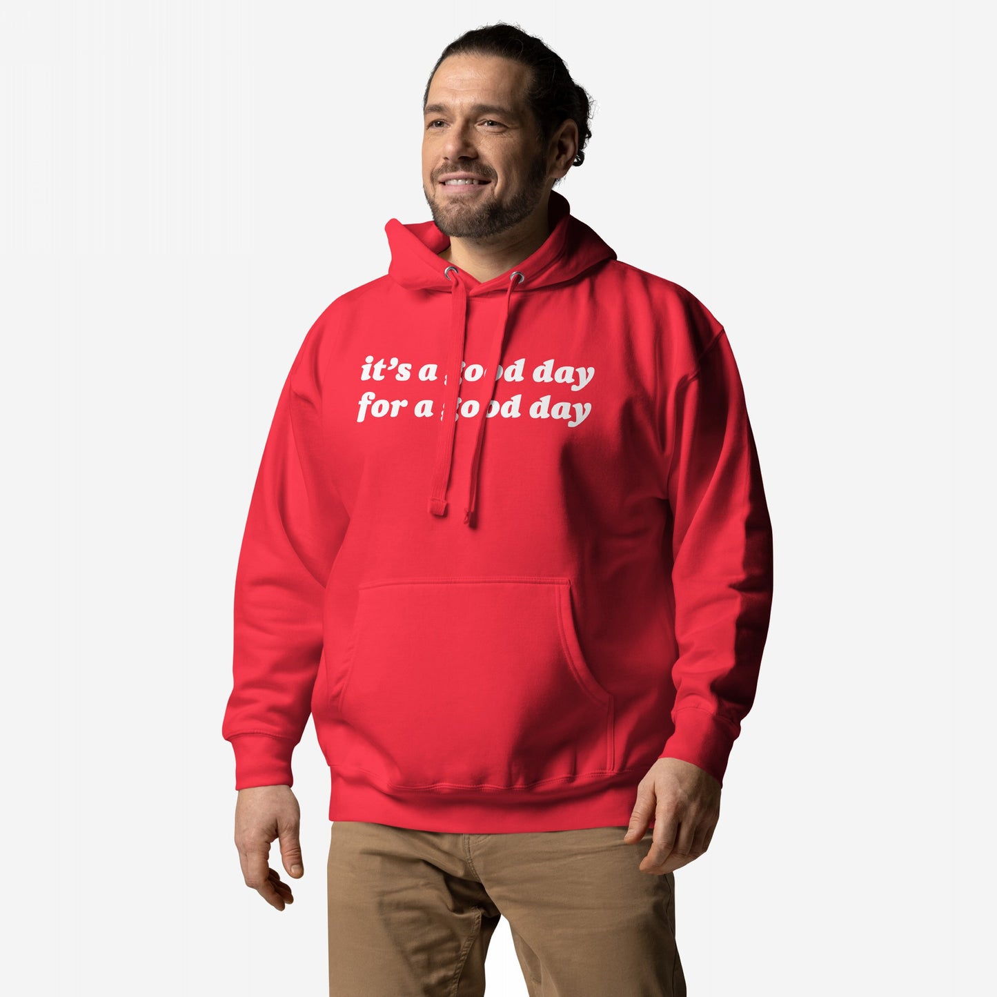 Man wearing the Good Day Hoodie EU, featuring a positive message on the chest. The bright red pullover has a front pouch pocket and drawstrings, embodying comfort and optimism.