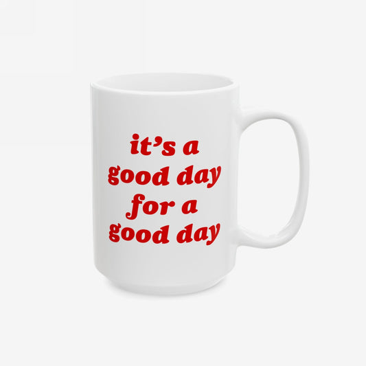 White ceramic Good Day Mug with red text: “it’s a good day for a good day.” Printed on both sides, it embodies hopeful optimism. Available in 11 oz. and 15 oz. sizes. Supports NAMI.