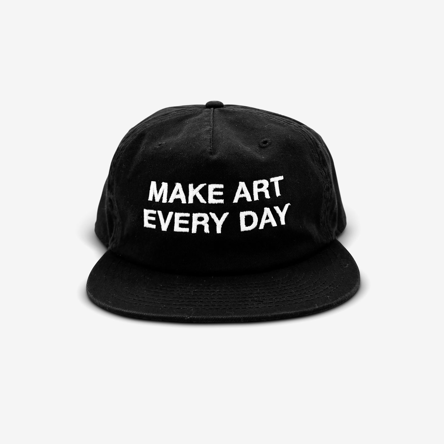 Make Art Every Day 5-Panel Hat features white embroidered text on a black, unstructured design with an adjustable metal clasp, marrying artful inspiration with eco-conscious fashion.