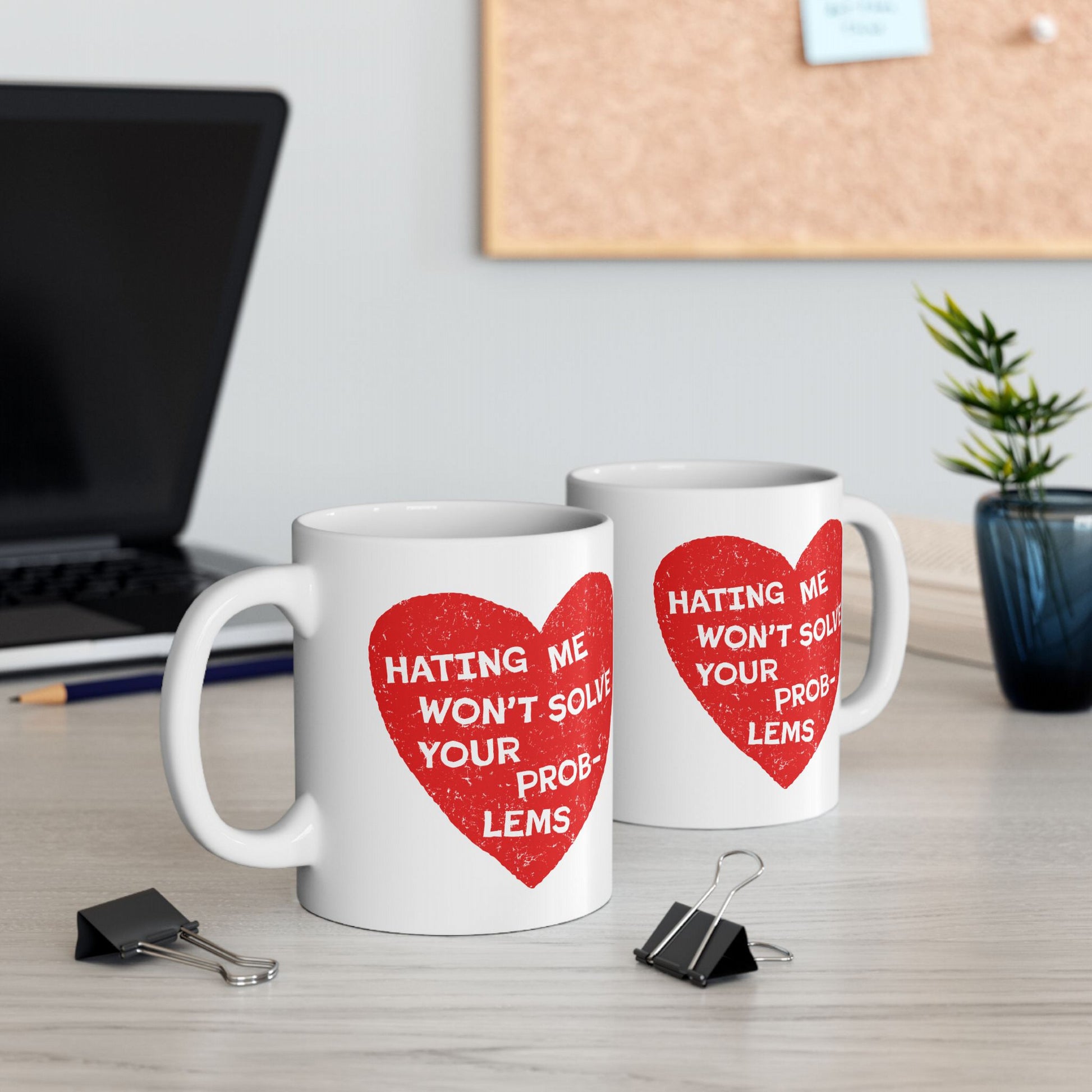 No Hate Mug featuring “Hating Me Won’t Solve Your Problems” in red heart on white ceramic, microwave and dishwasher safe.