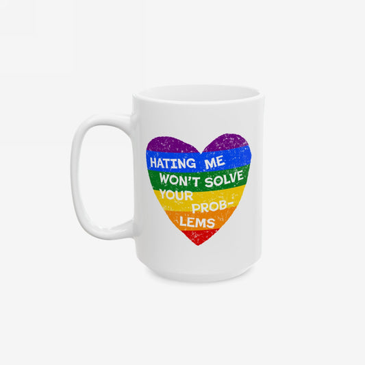 No LGBTQ Hate Mug with rainbow heart and quote "Hating Me Won’t Solve Your Problems," supporting love, inclusion, and queer pride.