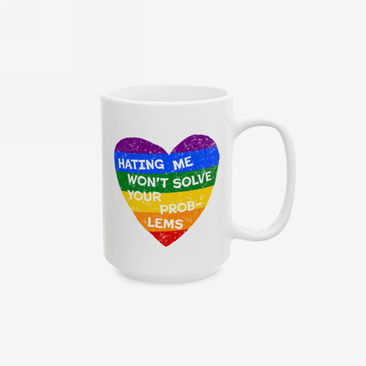 No LGBTQ Hate Mug with rainbow heart and quote "Hating Me Won't Solve Your Problems" supporting queer pride and inclusion.