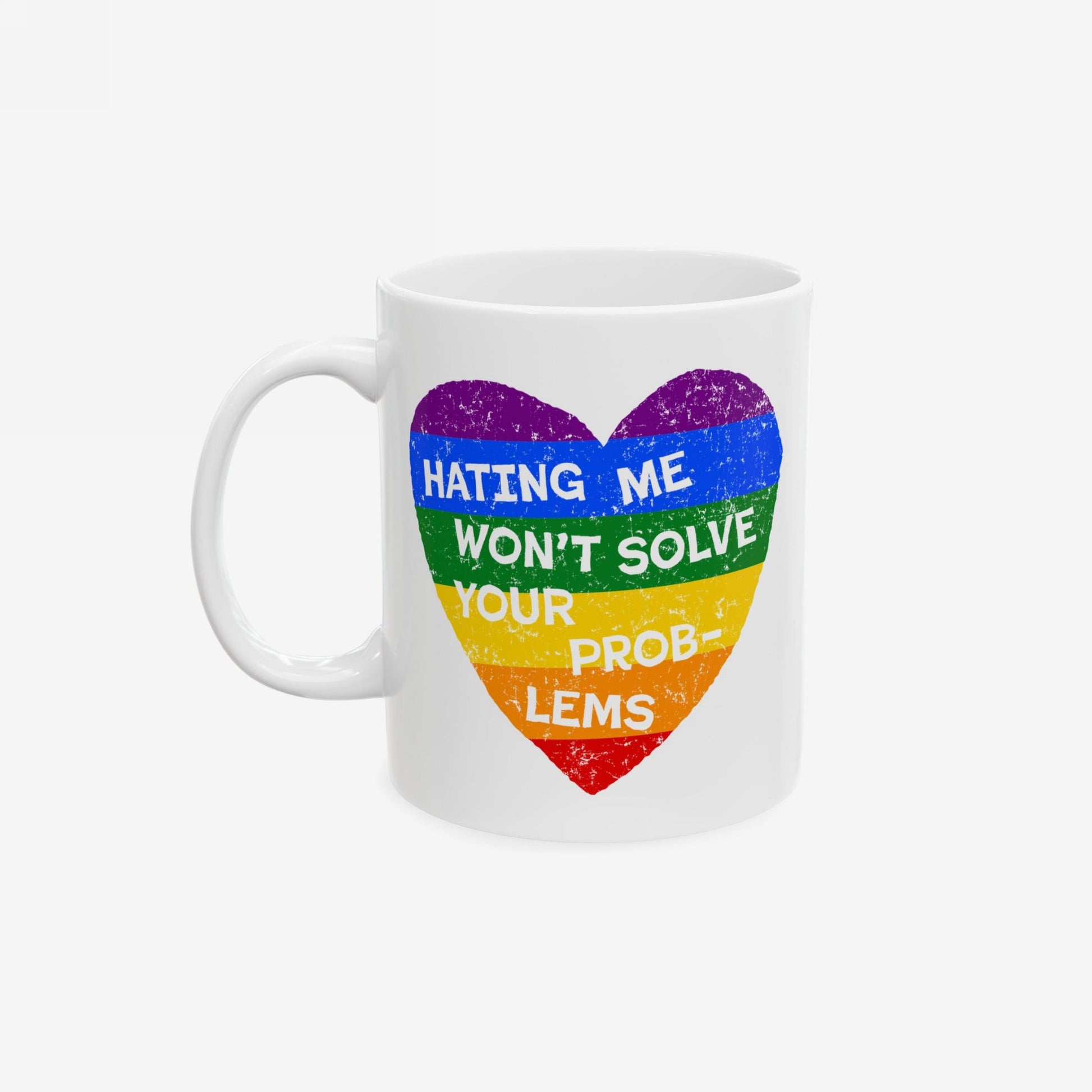 No LGBTQ Hate Mug with rainbow heart and quote "Hating Me Won't Solve Your Problems" supporting queer pride and inclusion.