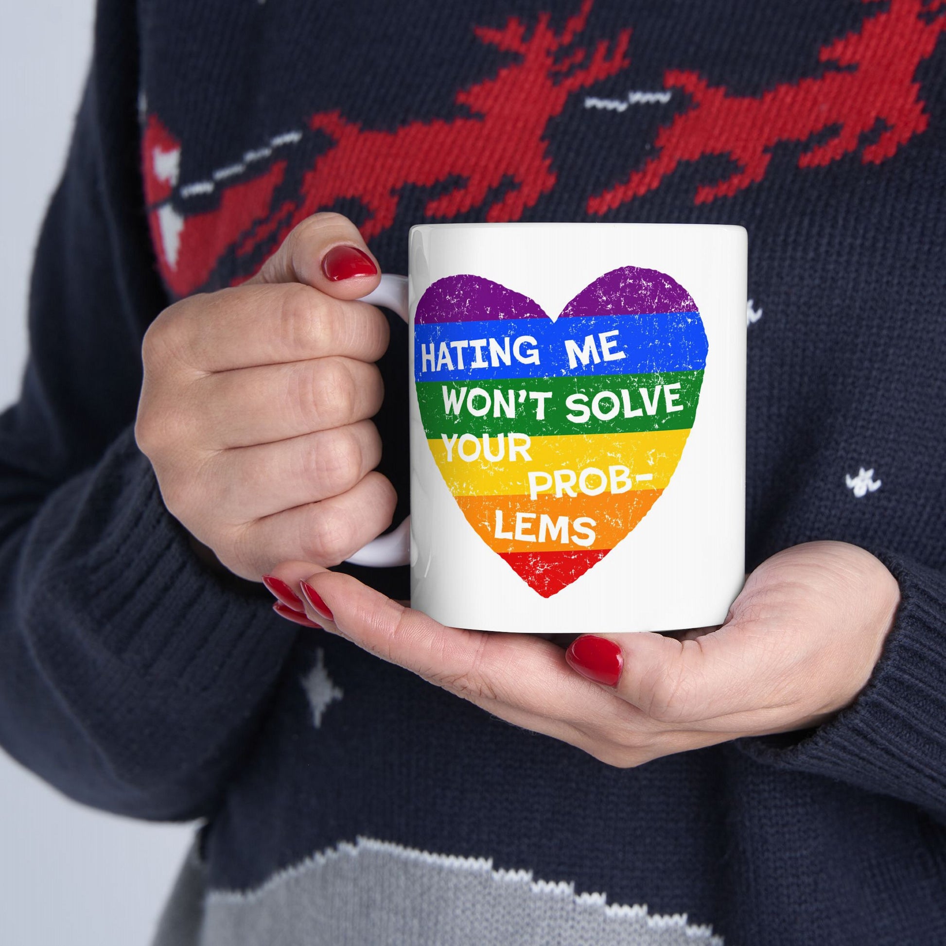 No LGBTQ Hate Mug featuring a rainbow heart and the quote "Hating Me Won't Solve Your Problems" promoting queer pride.