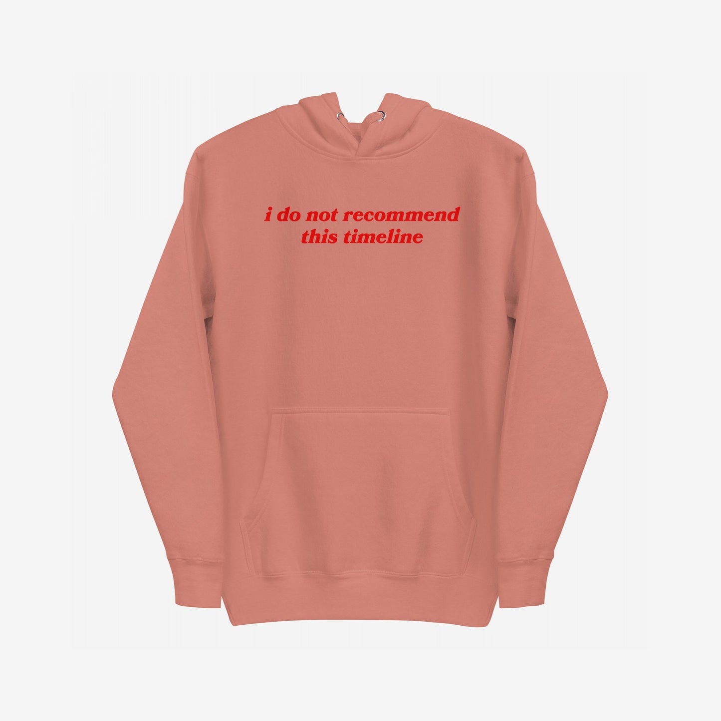 Timeline Hoodie EU features a kangaroo pocket and red serif italics stating “i do not recommend this timeline”, designed for those feeling overwhelmed. Perfect for comfortable, expressive everyday wear.
