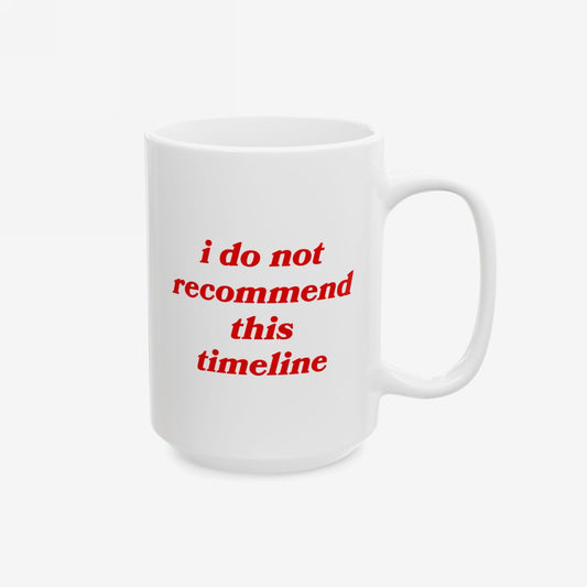 Timeline Mug: A white ceramic mug featuring red italicized text, i do not recommend this timeline. This mug humorously embodies the daily struggle, aligning with Egoproof's mental health-focused ethos.