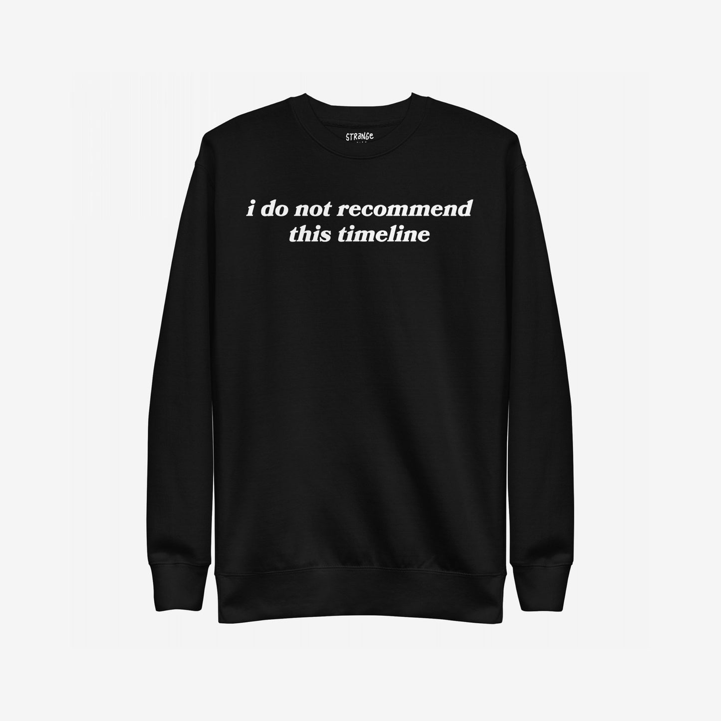 Black crewneck sweatshirt with white text, “i do not recommend this timeline,” across the chest. The Timeline Sweatshirt EU offers a sarcastic take on modern life.
