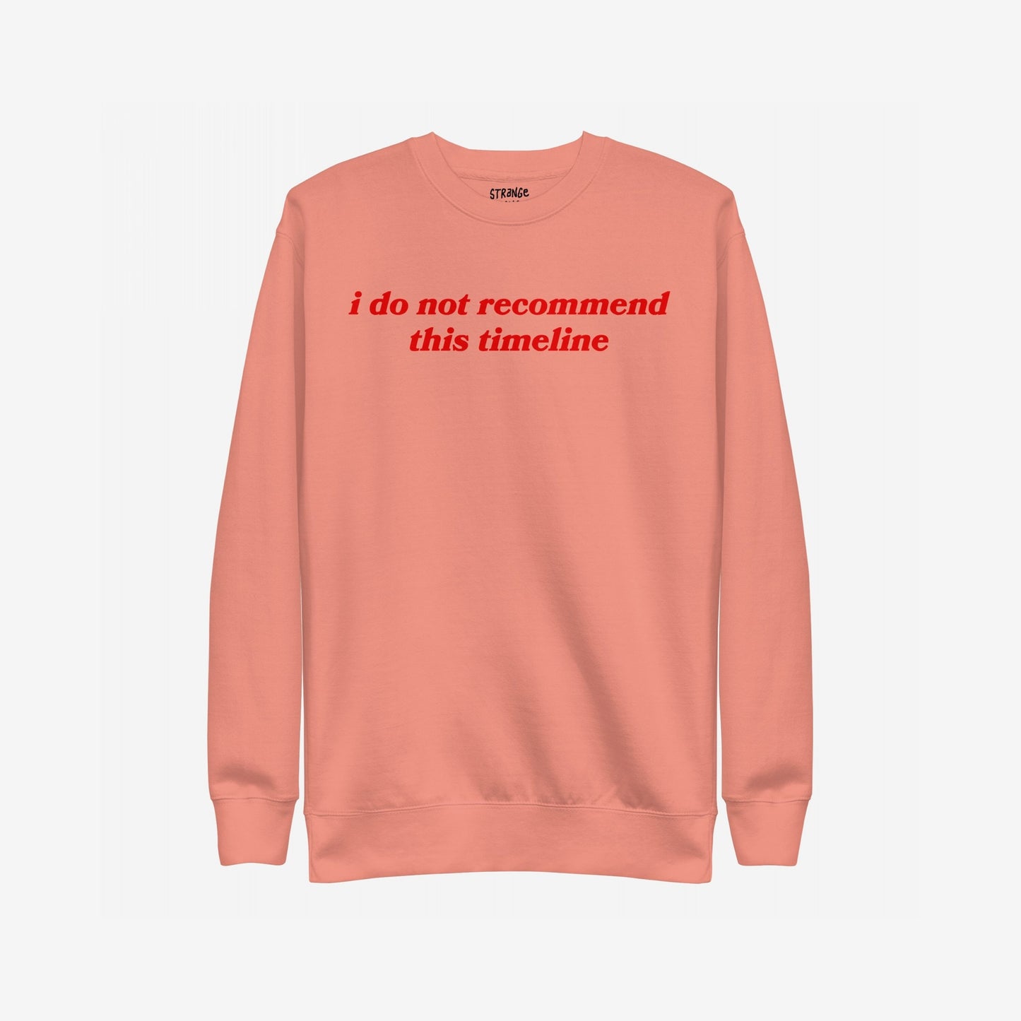 Timeline Sweatshirt EU with bold red italic text reading “i do not recommend this timeline” across the chest; a midweight crewneck for those embracing dry humor and societal critique.