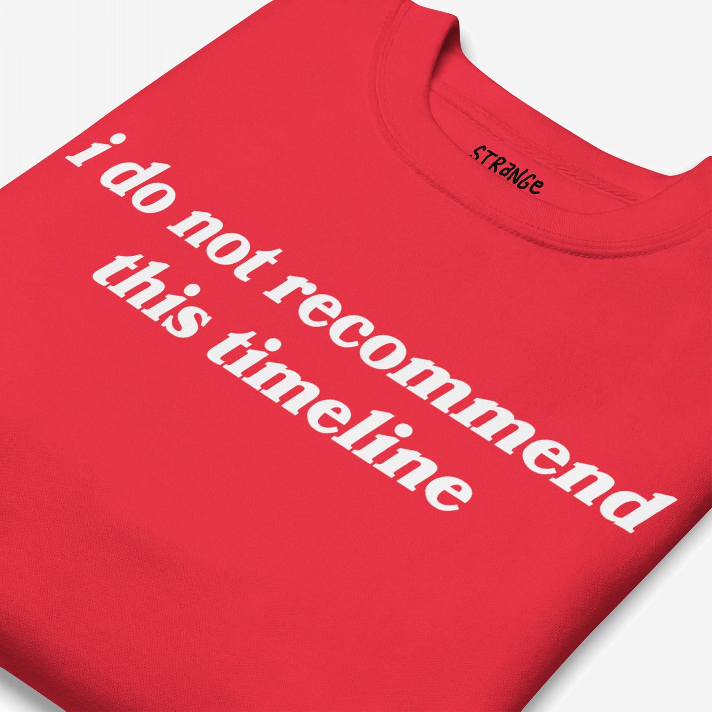The Timeline Sweatshirt EU features bold white text stating i do not recommend this timeline on a red T-shirt, highlighting a satirical take on modern-day challenges.