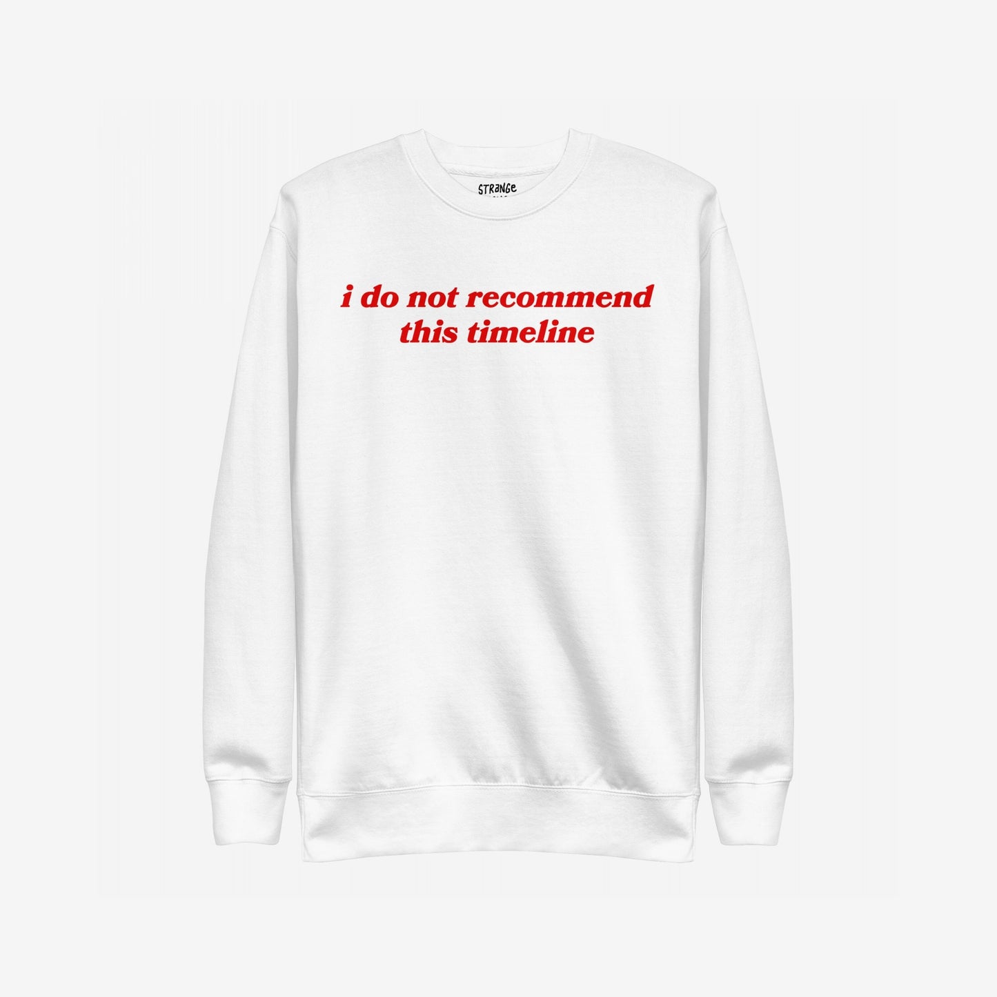 White long-sleeve crewneck sweatshirt with bold red text “i do not recommend this timeline” on chest, branded as Timeline Sweatshirt EU. It humorously highlights societal burnout, supporting mental health awareness through NAMI donations.