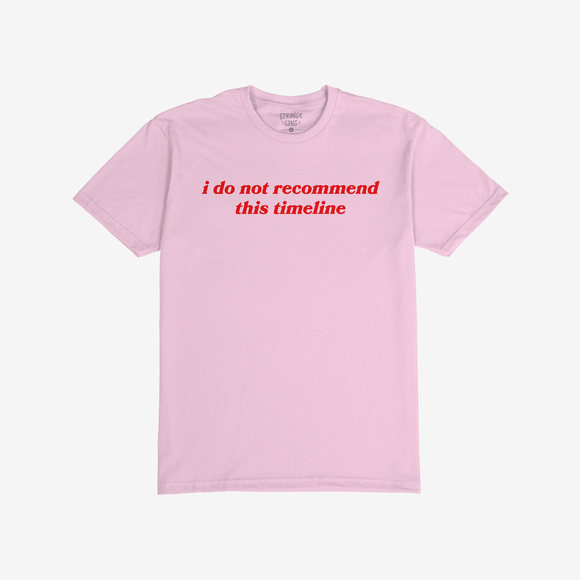 Timeline T-shirt in light pink with bold red text reading "i do not recommend this timeline" in a casual unisex style.