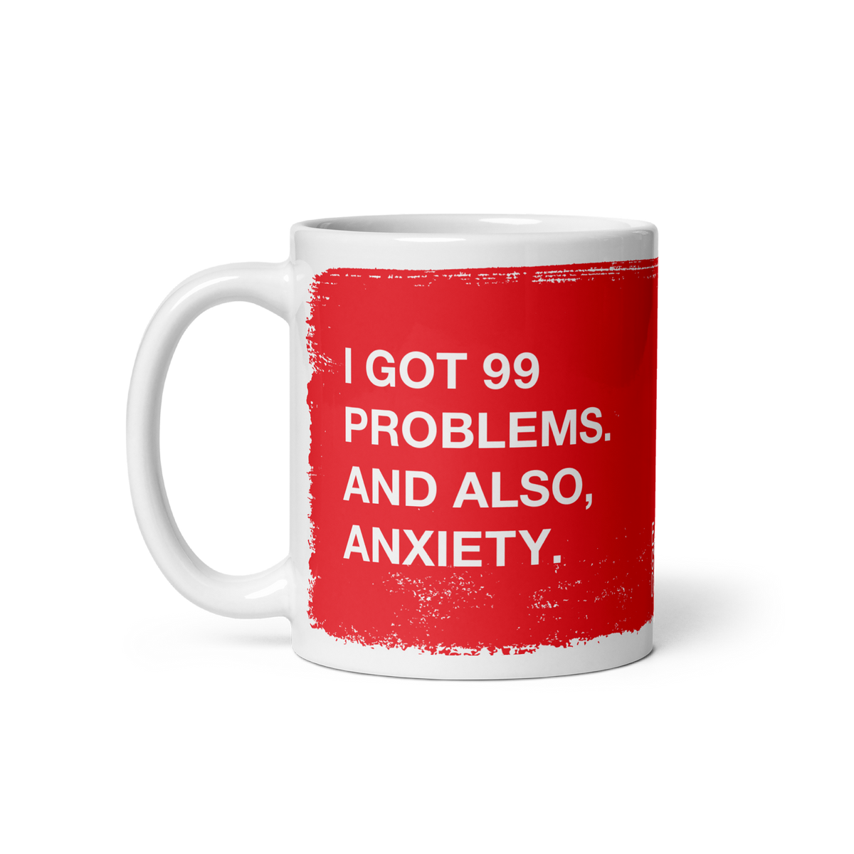 White ceramic 99 Problems Mug with red text stating "I got 99 problems. And also, anxiety." on both sides.