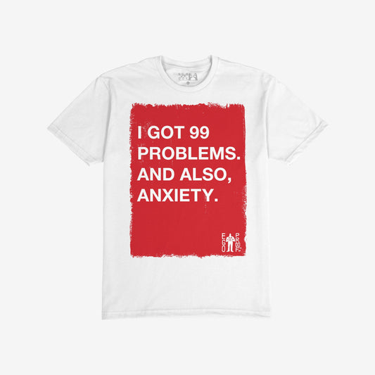 White 99 Problems T-shirt with bold red block and humorous text admitting “I GOT 99 PROBLEMS. AND ALSO, ANXIETY.”