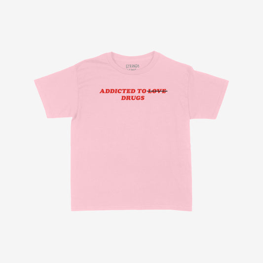 Addicted To Love / Drugs Women's Baby Tee Pink by EGOPROOF