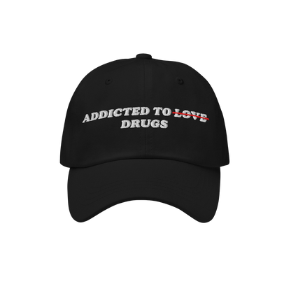 The Egoproof Addicted To Love / Drugs Hat is a black embroidered snapback featuring white ADDICTED TO DRUGS text with LOVE cr