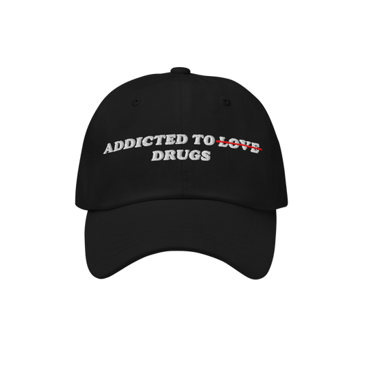 The Egoproof Addicted To Love / Drugs Hat is a black embroidered snapback featuring white ADDICTED TO DRUGS text with LOVE cr