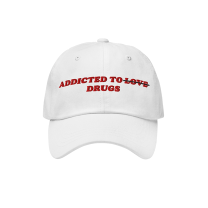 The Egoproof Addicted To Love / Drugs Hat is a white snapback with red embroidered text—LOVE is crossed out for DRUGS—mak