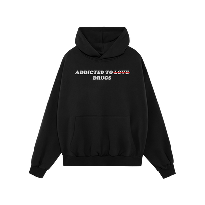 Egoproofs Addicted To Love / Drugs Hoodie features ADDICTED TO LOVE with LOVE crossed out in red and replaced by DRUGS—a bo