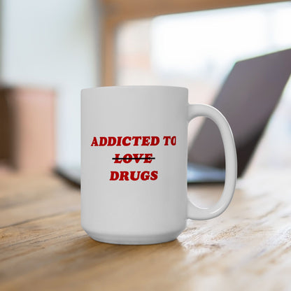 White ceramic mug with ADDICTED TO ~~LOVE~~ DRUGS in red text, capturing Egoproof's edgy humor. It's designed for those embracing mental health journeys with wit.