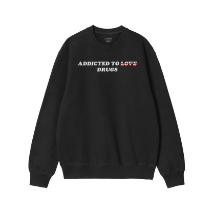 Black midweight fleece sweatshirt with sarcastic “Addicted To Love / Drugs Hoodie & Sweatshirt” text design emphasizing d