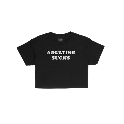 Adulting Sucks Women's Baby Tee in black with bold white text, fitted style, perfect for layering and casual wear.