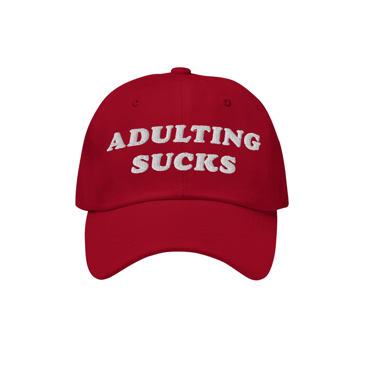 Red baseball-style cap with ADULTING SUCKS embroidered in white on front, representing Egoproof's relatable, bold apparel. Id