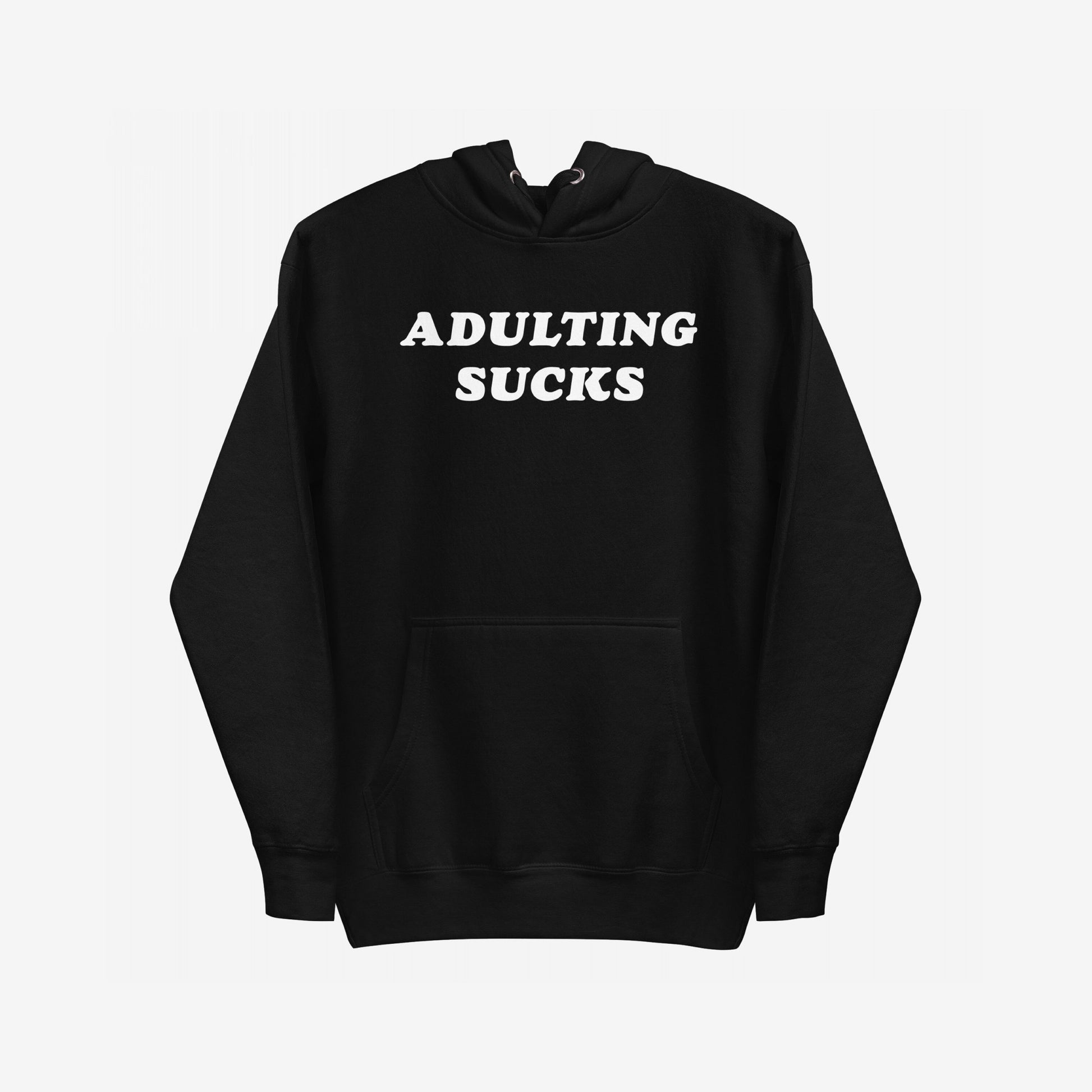 Adulting Sucks Hoodie EU features bold white text ADULTING SUCKS on a black pullover with a kangaroo pocket and drawstring hood, embodying comfort and sarcasm for navigating life's challenges.