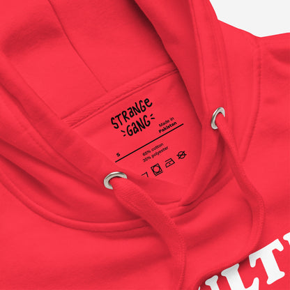 Adulting Sucks Hoodie EU, a red hoodie featuring a neck label detailing Made in Pakistan, size S, fiber content, care symbols, hood drawcords, and partial white graphic, embodies comfort for procrastinators.