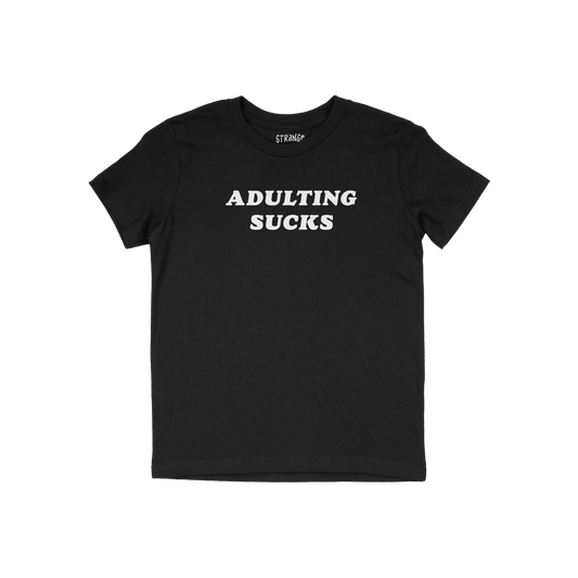 Adulting Sucks Kids T-shirt in black with white bold text, designed for tweens expressing sarcasm and eye-roll energy.