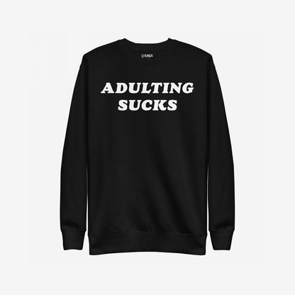 The Adulting Sucks Sweatshirt EU features bold white lettering on a black crewneck, expressing burnout humor. It’s a unisex staple for low-effort days, supporting NAMI with each purchase.
