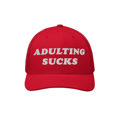 Adulting Sucks Hat: A red trucker cap with bold white embroidery stating ADULTING SUCKS, reflecting a vintage, honest style p