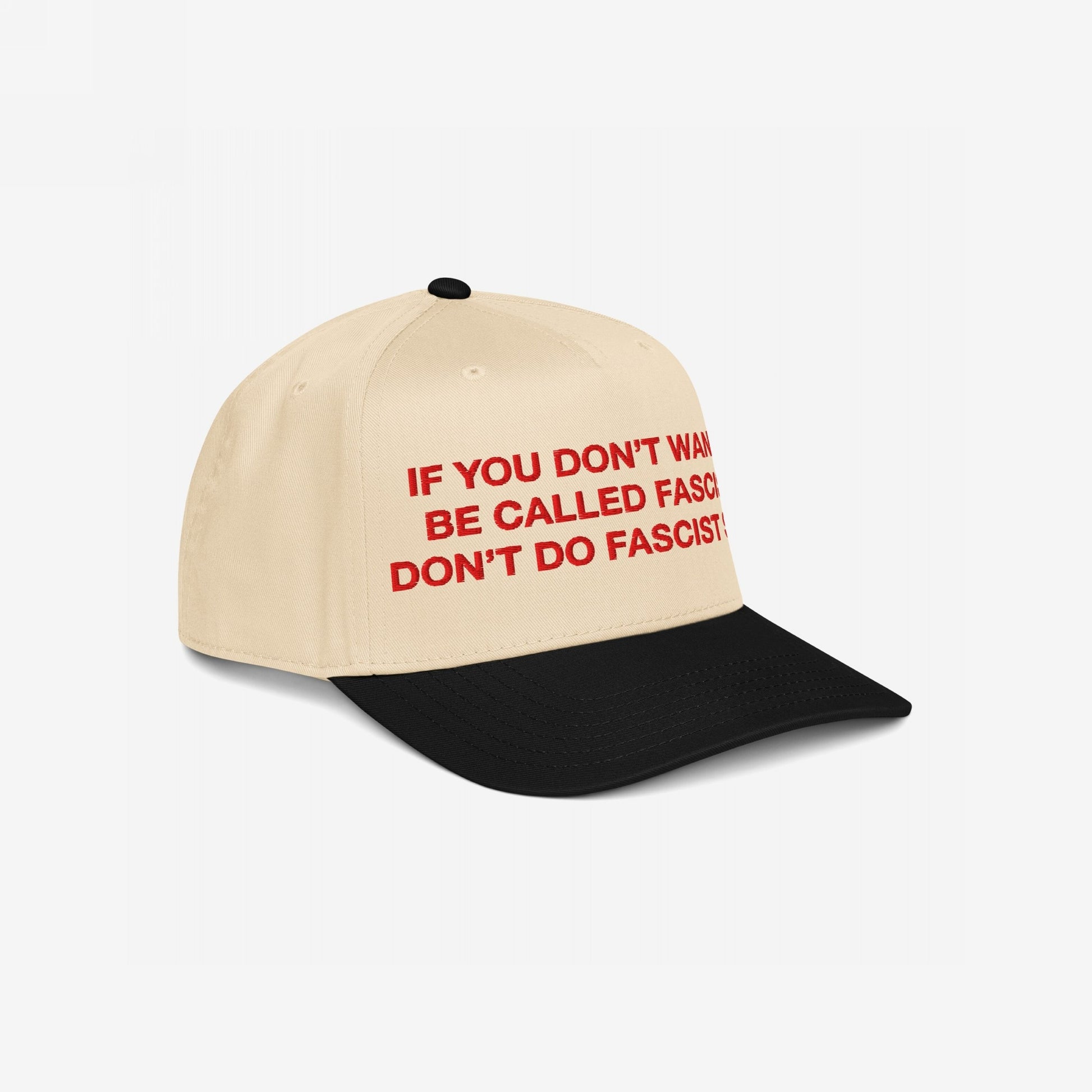 Anti-Fascist Hat features bold red embroidery with a powerful message on a cream crown and black bill. This 5-panel cap embodies Egoproof's commitment to justice and mental health awareness.