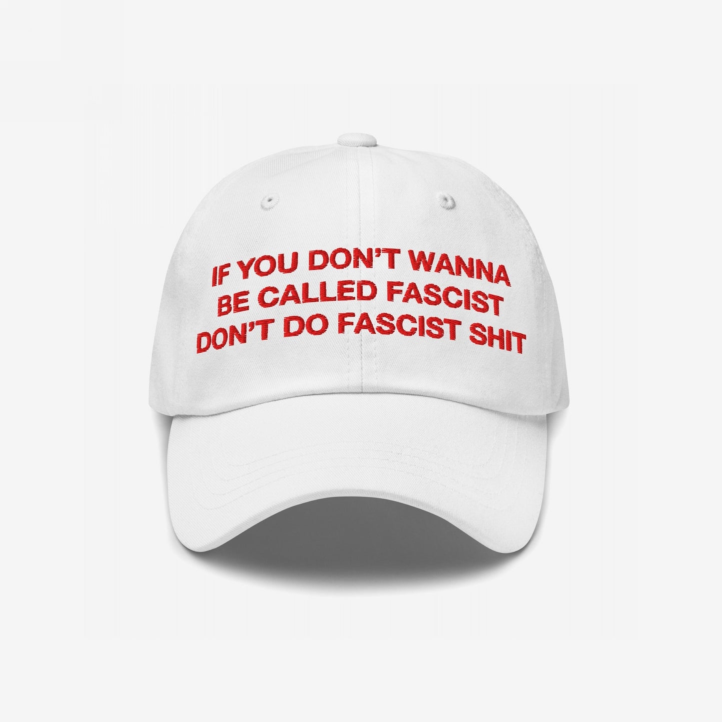 Anti-Fascist Hat with bold red embroidered text: “IF YOU DON’T WANNA BE CALLED FASCIST DON’T DO FASCIST SHIT.” A powerful statement piece for those who resist silently, featuring EGOPROOF embroidery on the back.
