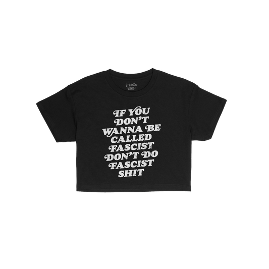 Anti-Fascist Women's Baby Tee featuring bold white text: “If you don’t wanna be called fascist don’t do fascist shit.��